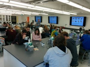 Med bio students working in a lab.