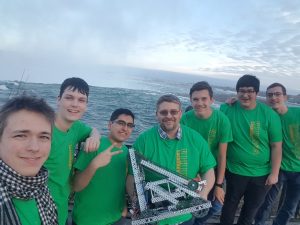 A group photo of Lockerby Robotics in front of Niagara Falls.