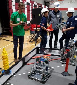 A Lockerby student controlling our robot at a VEX Robotics Competition.