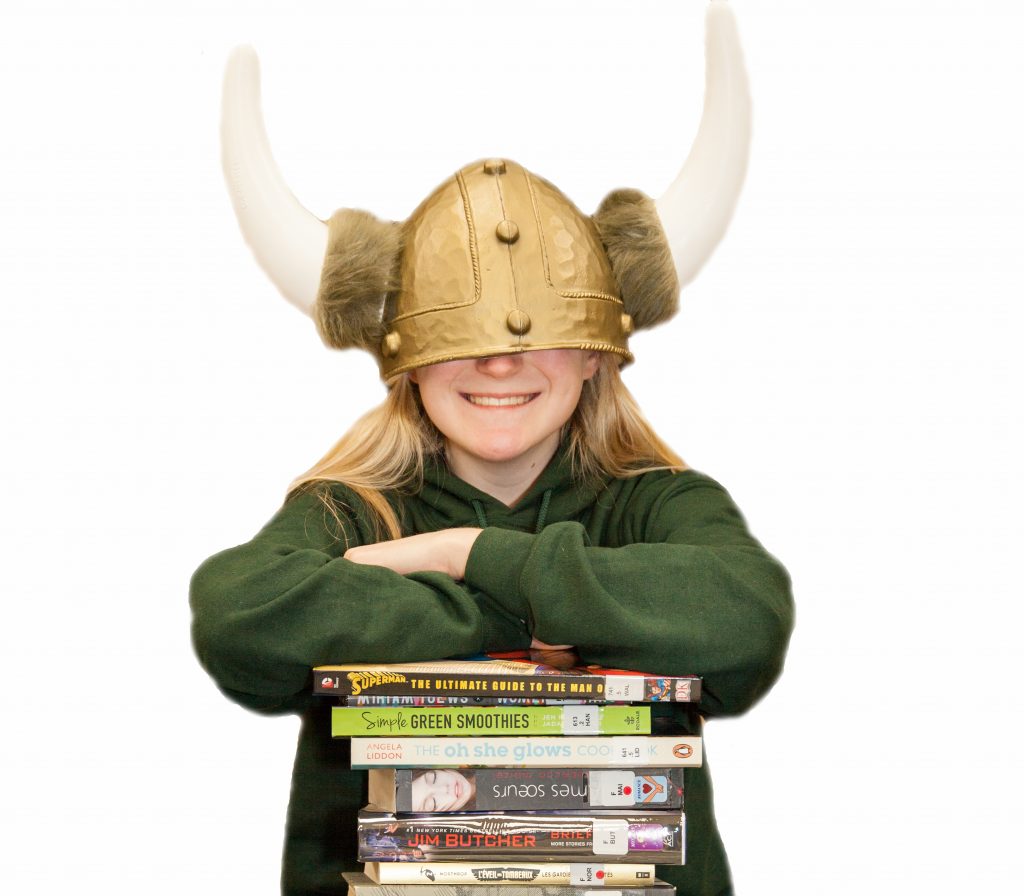Student wearing oversized Viking helmet